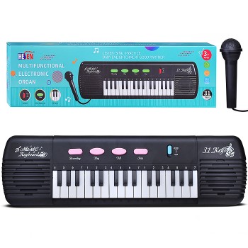 Синтезатор "Юнный композитор" в коробке