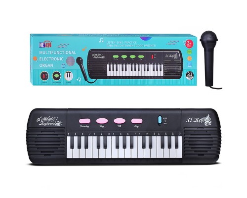 Синтезатор "Юнный композитор" в коробке