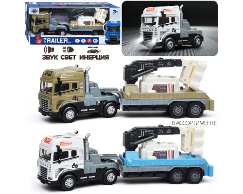 Машина "Тягач с прицепом и прожекторами на манипуляторе" (свет, звук) в коробке